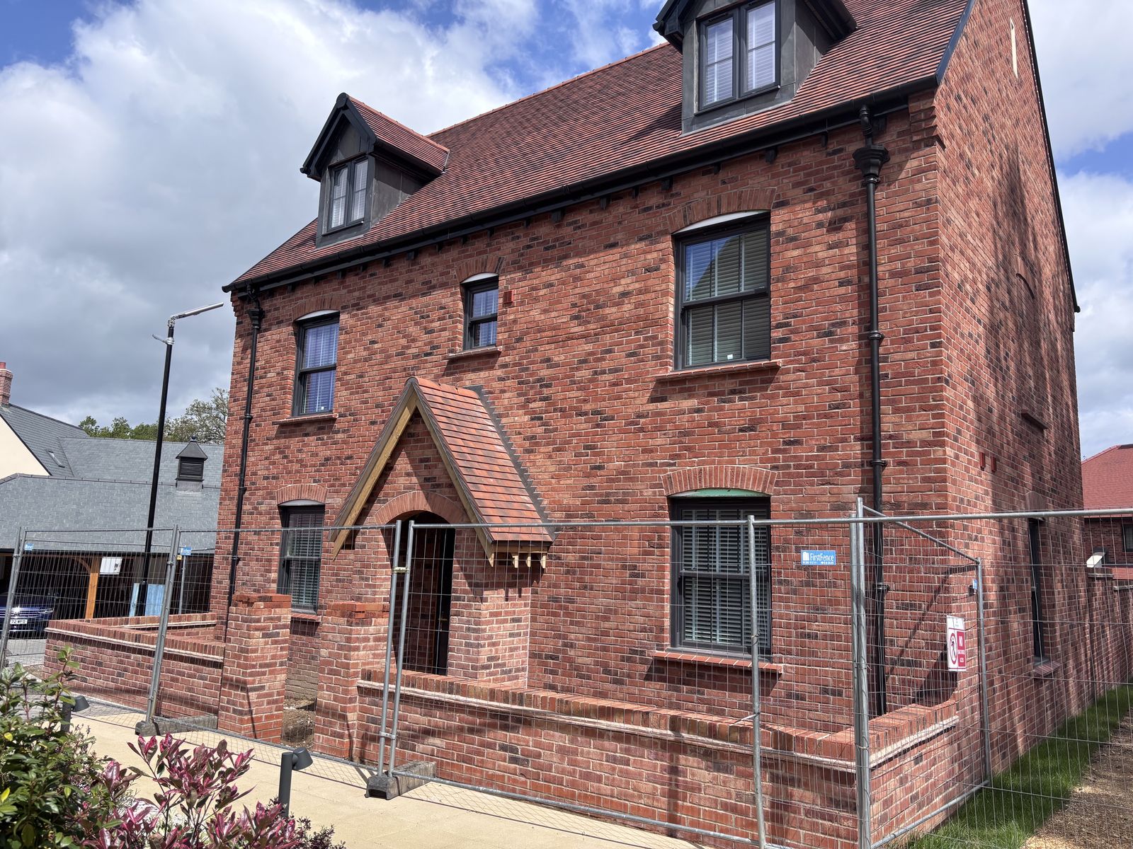 Completed red-brick home at the BOSC development