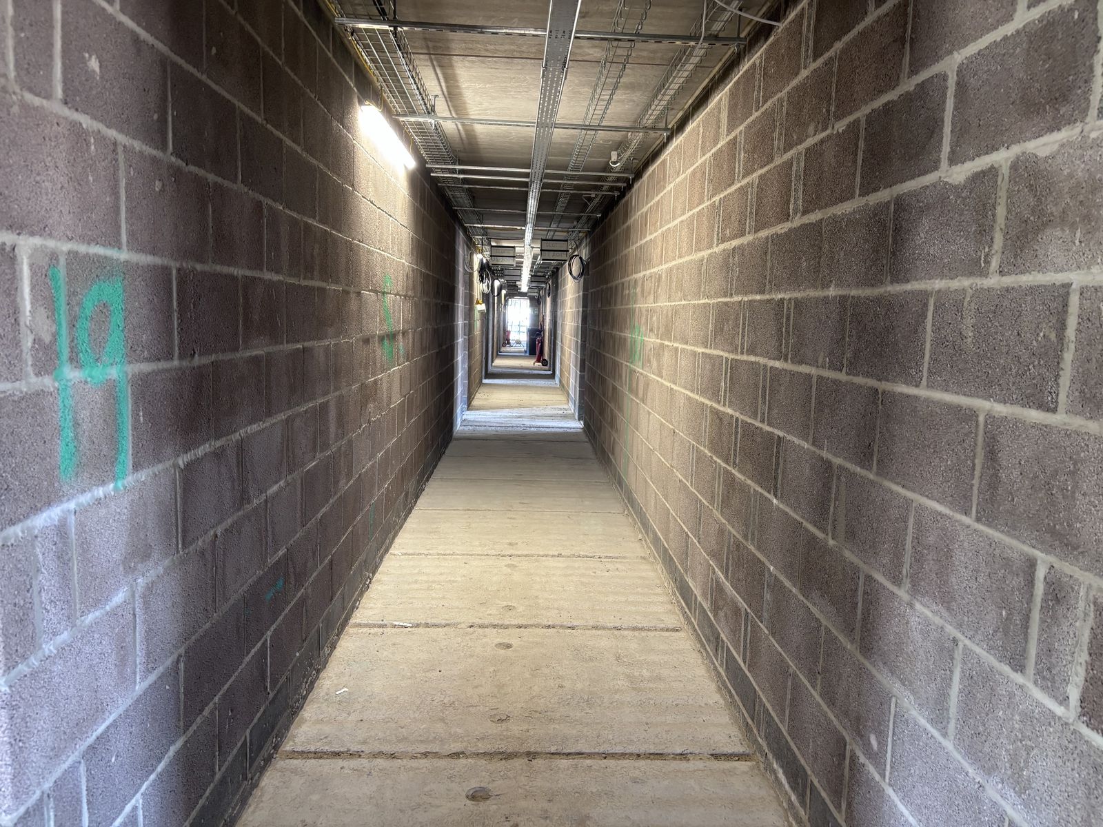 Internal blockwork corridor at the Chichester development