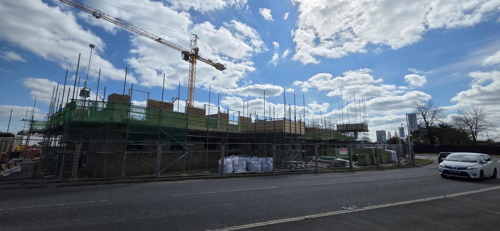 Chichester site — scaffold and tower crane alternate angle