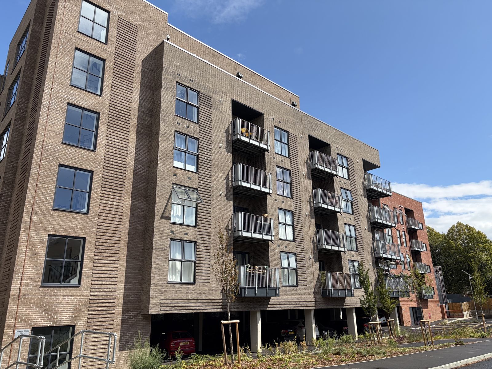 Pale-brick apartments with balconies at East Point