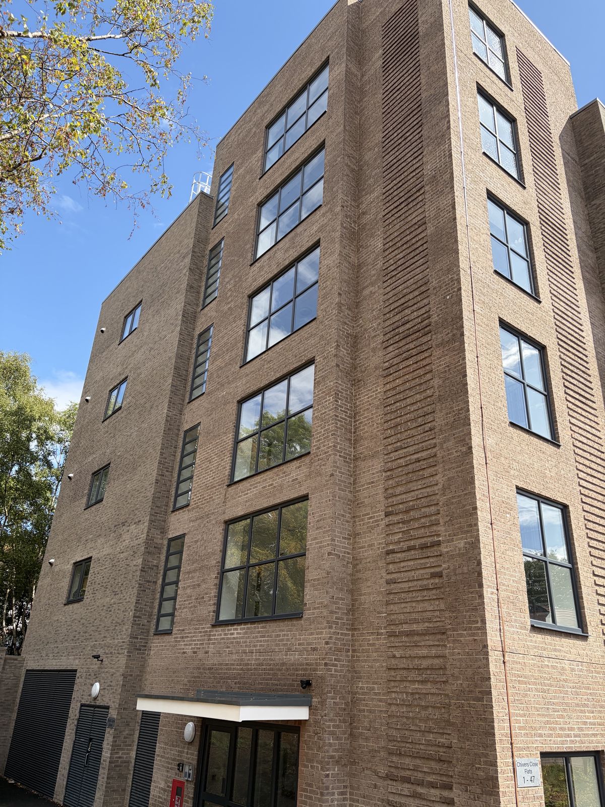 End elevation of a completed apartment building at East Point