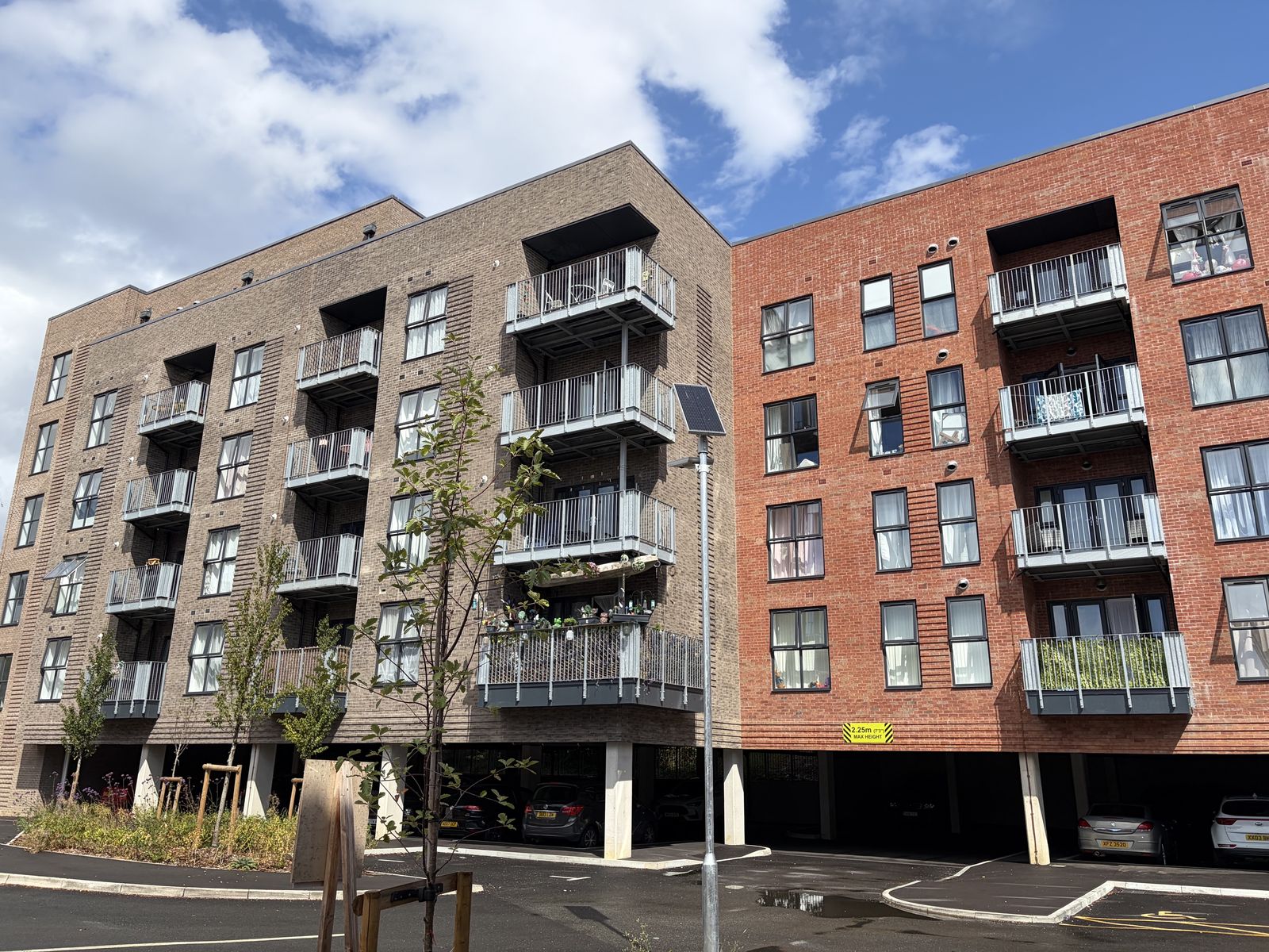 Mixed-brick apartment buildings and parking at East Point