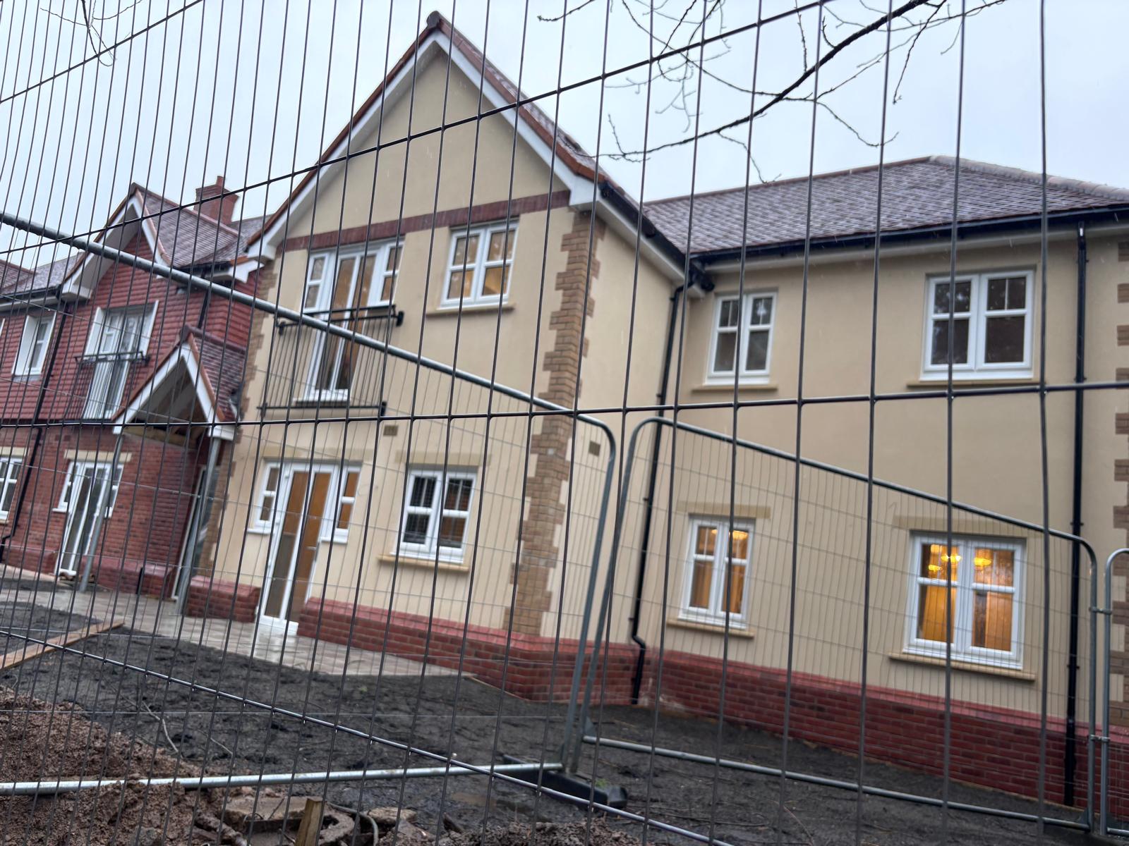 Liphook rendered + brick semis — finished