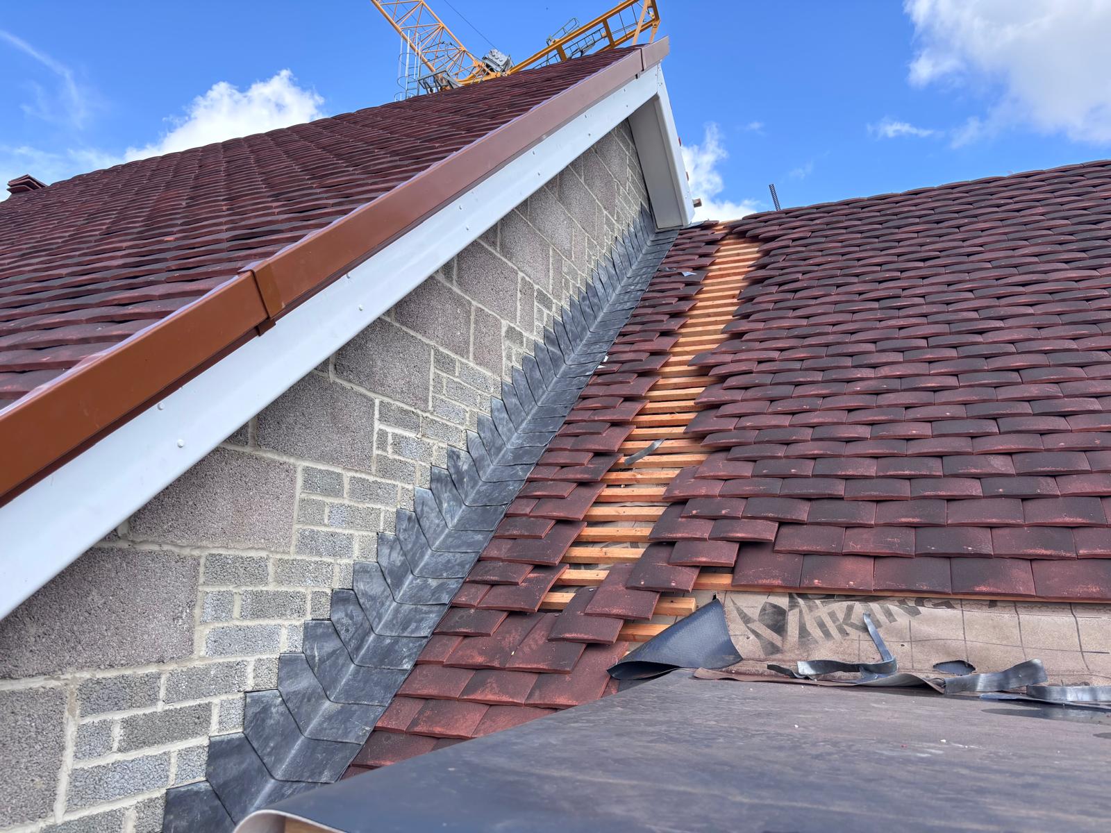 Liphook roof detail — lead stepped flashing and clay tile work