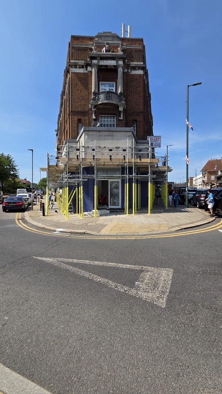 Scaffolding around the corner elevation of a North London building