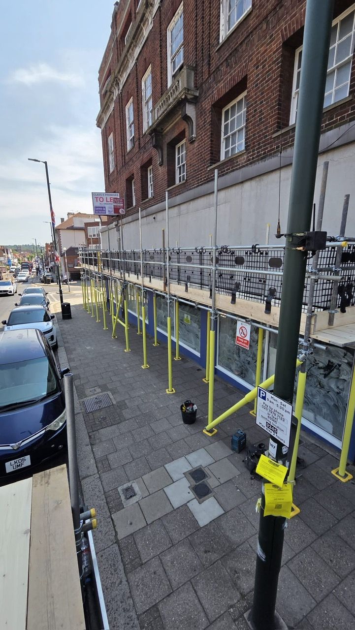 Scaffolded pavement route viewed from above in North London